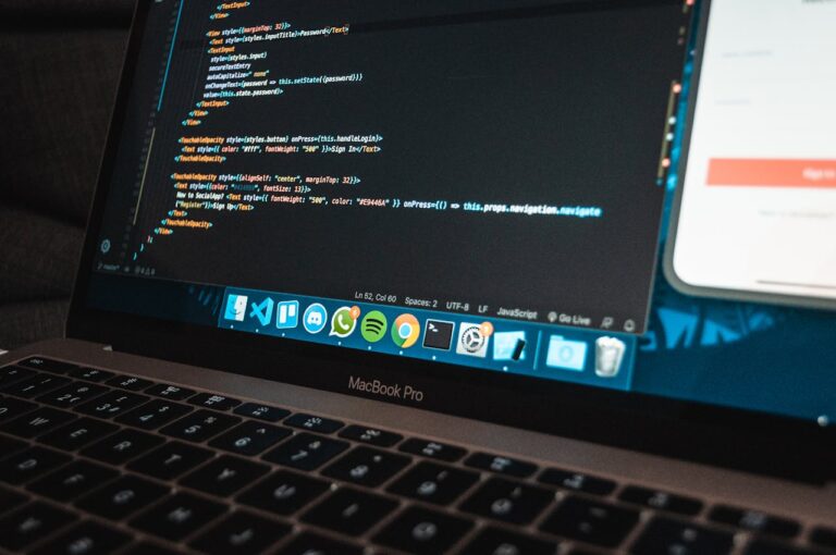 The Art of Drawing Readers In: Your attractive post title goes here Close-up of a laptop with code on the screen, perfect for illustrating programming concepts.